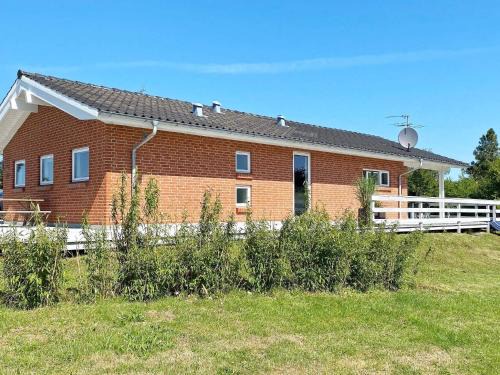 Pøt Strandby House | 10 person holiday home in Juelsminde-By Traum