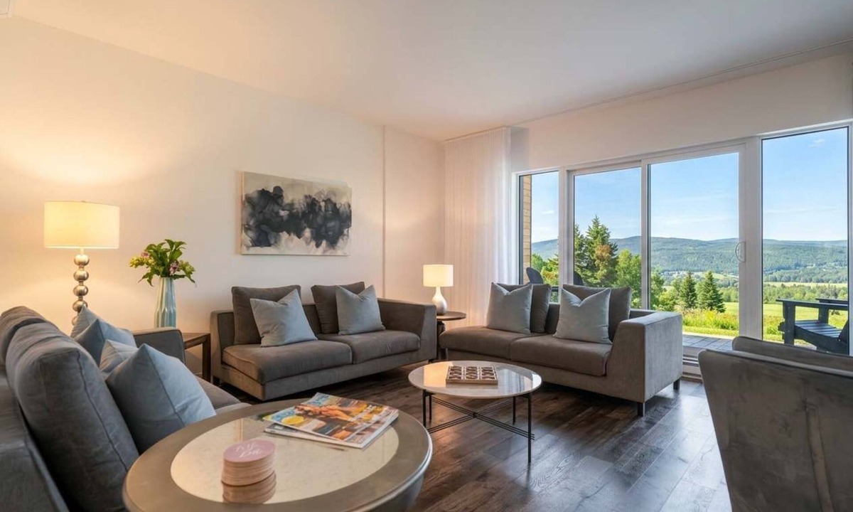 Baie-St-Paul Apartment | 108 | Chic Condo | River View & Comfort with Pool