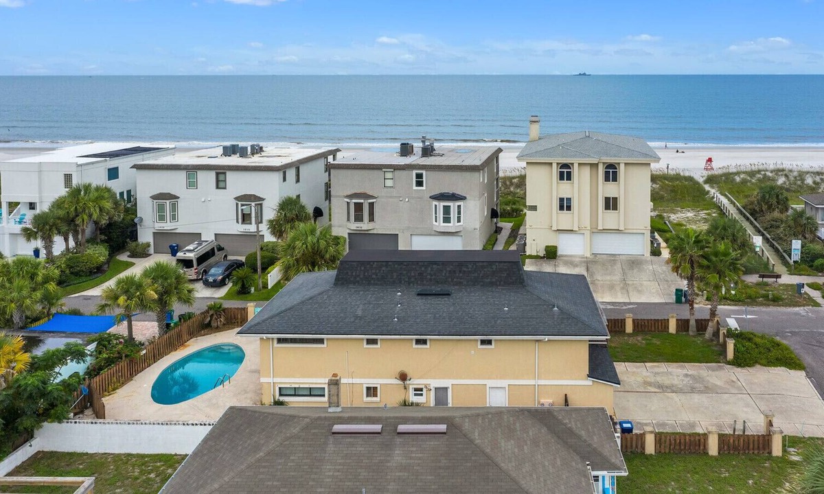 Neptune Beach House | 2 Bedroom 1 Bath Duplex Just steps from the beach with a Pool