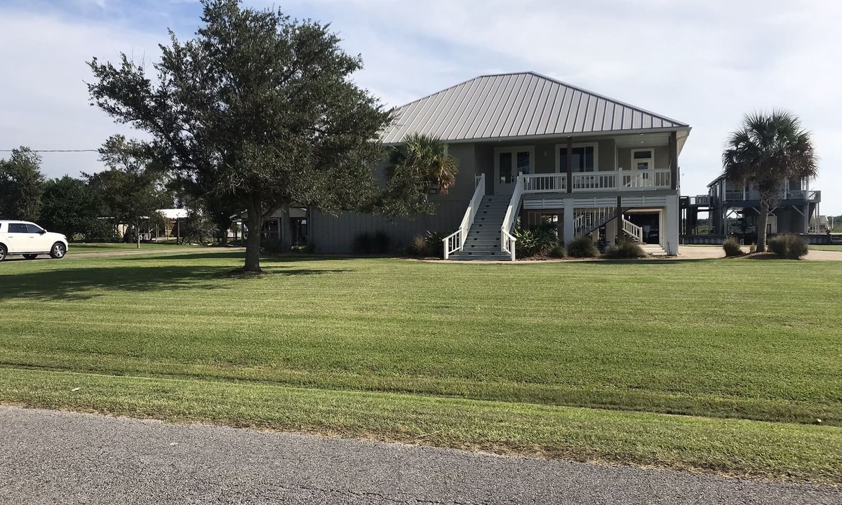 Hackberry House | 200 feet on the water with boat house!