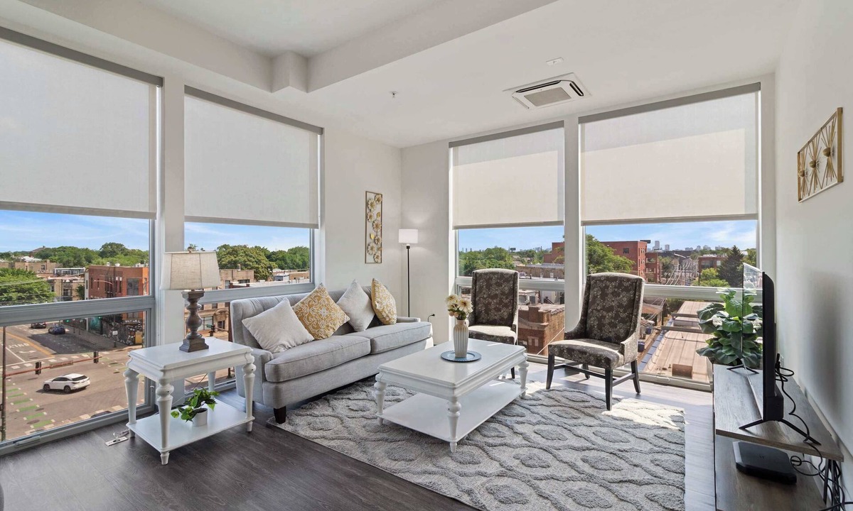 Palmer Square Apartment | 2BR City Loft Sweeping Glass Views