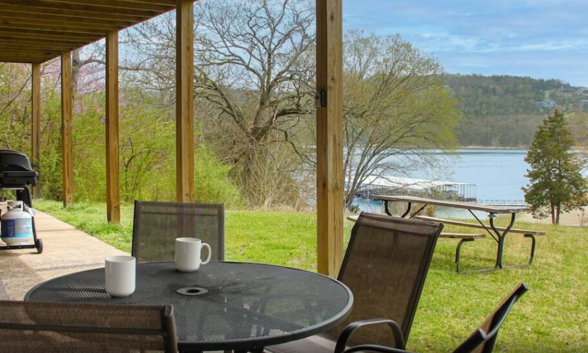 Indian Point Condo | 2BR Waterfront Duplex Cabin w/Pool + Swim & Boat dock