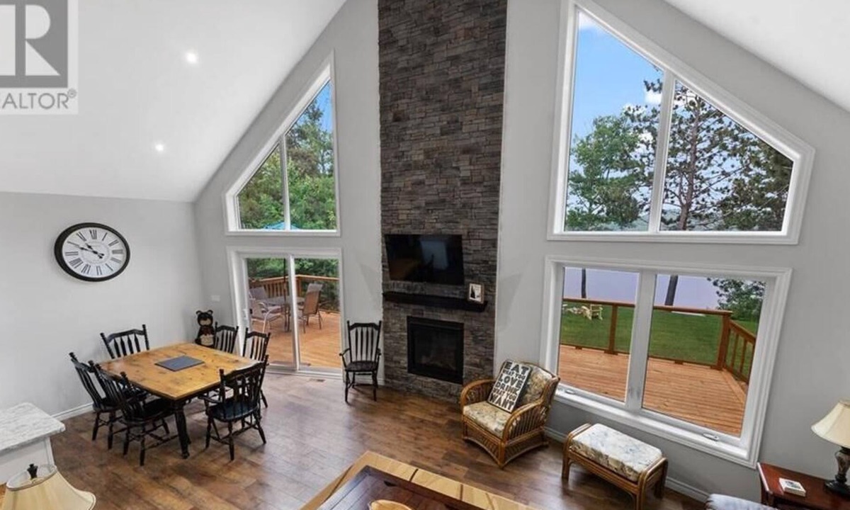 Madawaska Valley Cottage | 3 bedroom open concept Lake front house with shallow entry, sandy bottom beach