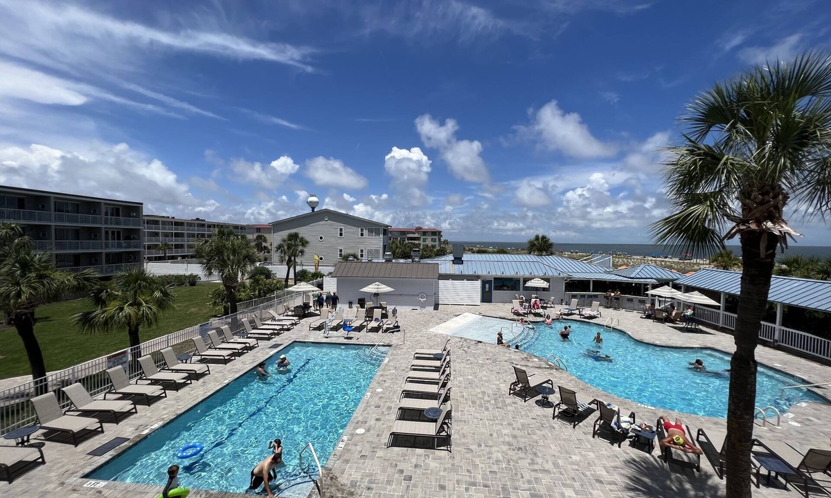 Tybee Island Condo | 30 Steps to the Beach! Luxury Condo with Large wrap-around porch!