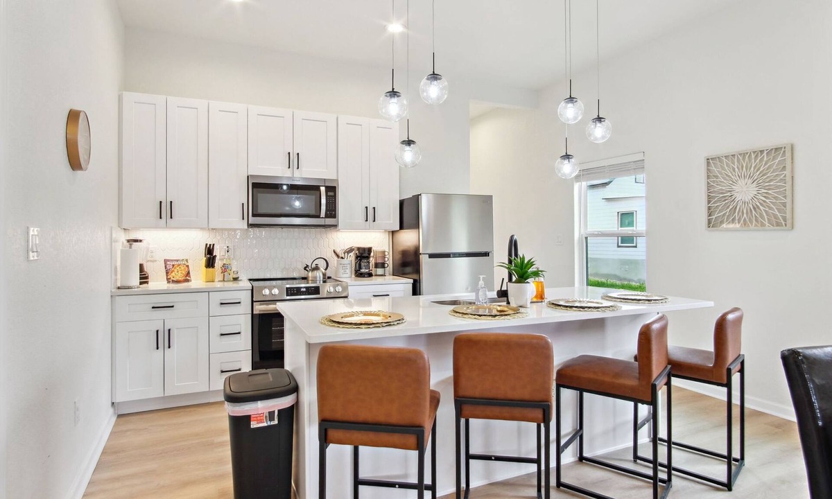 Near East Side Apartment | 3br-2ba Cityscape Haven With Panoramic Tower View