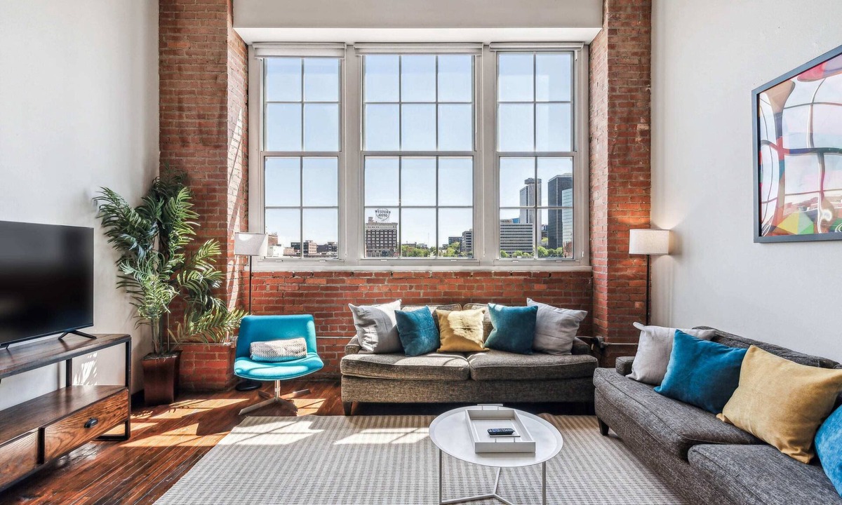 Crossroads Arts District Apartment | 3BR Stunning Downtown Historic Loft with Gym