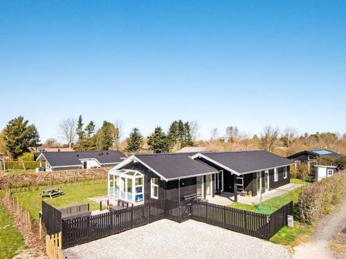 Pøt Strandby House | 4 star holiday home in Juelsminde