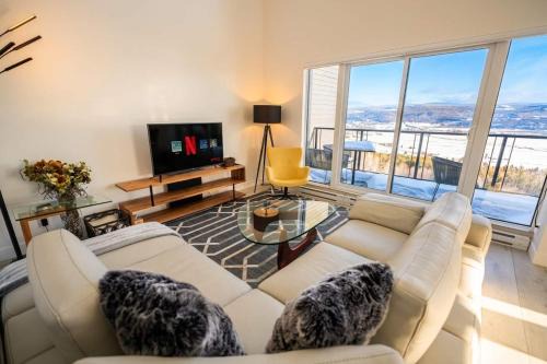Baie-St-Paul Apartment | 401 - High-End Condo - Incredible View and Pool