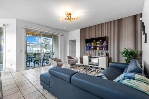 Trafalgar Village Villa | 4BR Modern Home in Kissimmee Sleeps 10 with Heated Pool and BBQ
