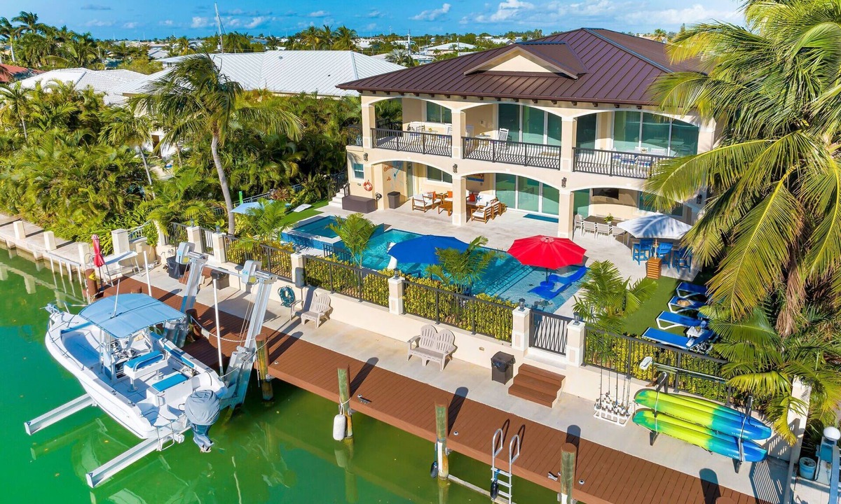 Key Colony Beach House | 5 bedrooms, pool/spa heated, bikes, kayaks, game room, elevator, deep 75' dock.