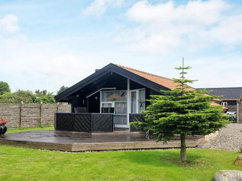 Hasmark Strand House | 5 person holiday home in Otterup