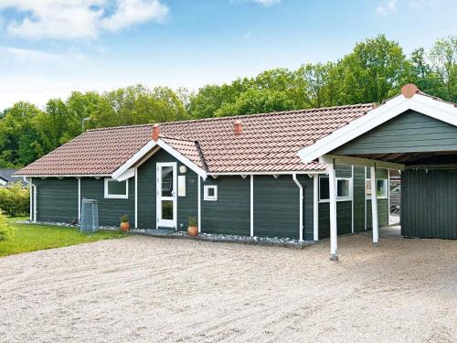 Pøt Strandby House | 5 star holiday home in Juelsminde