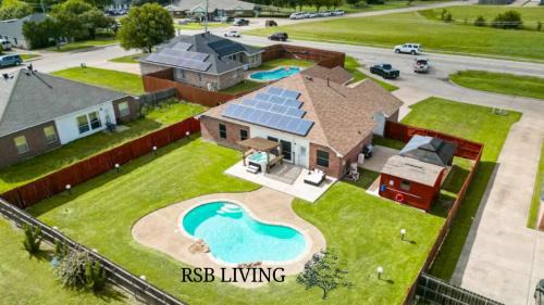 DeSoto Villa | 5BR Getaway in DeSoto with Pool Hot Tub & Cinema