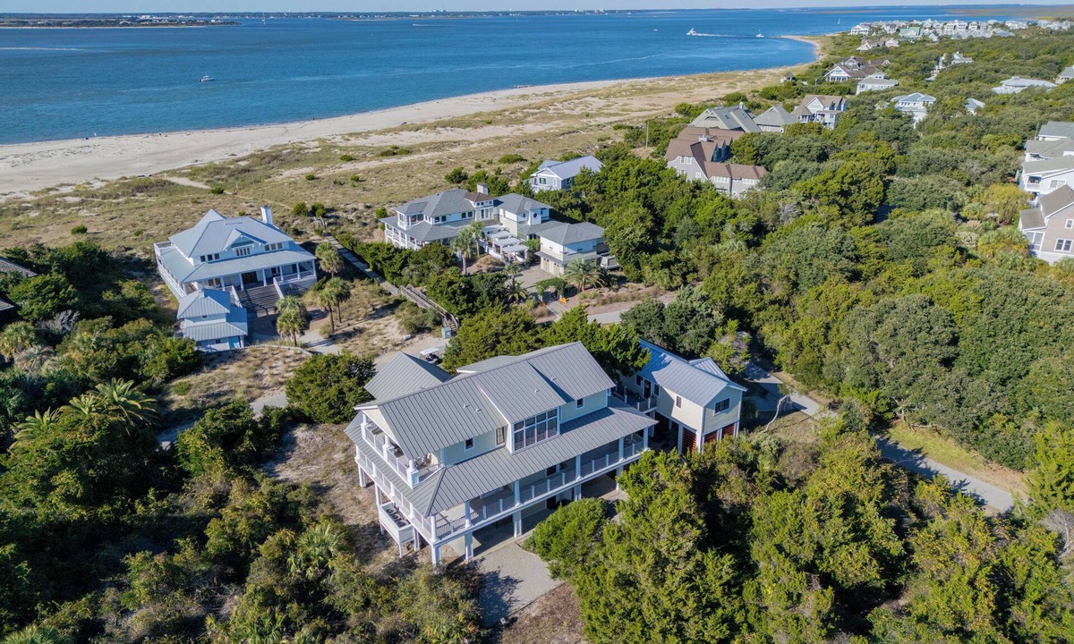 West Beach House | 7-bedroom water view compound with elevator featuring a main house and annex.