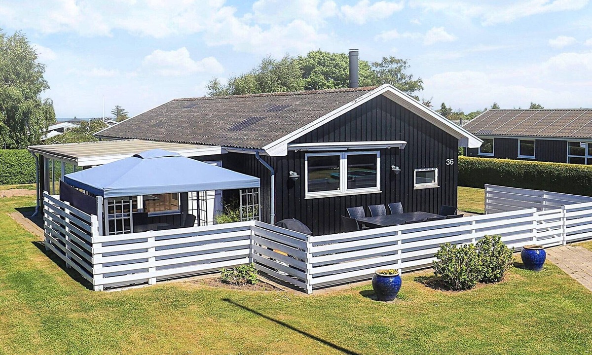 Hasmark Strand House | 8 person holiday home in Otterup