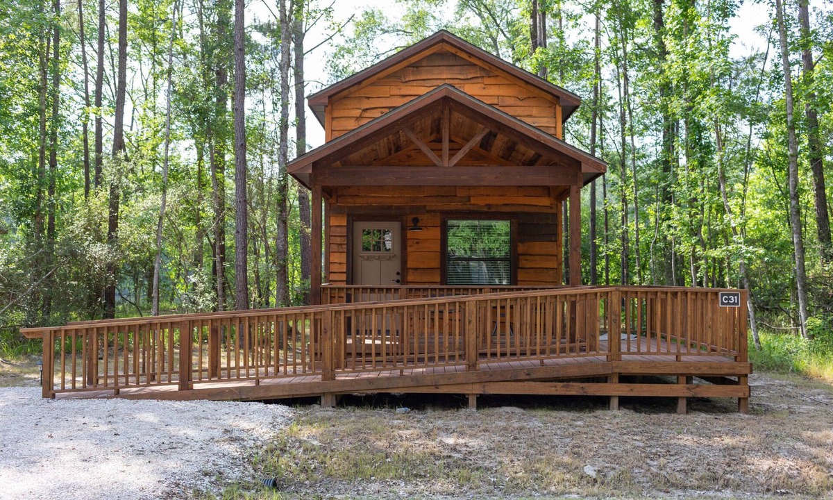 Oakhurst Cabin | A cozy little ADA accessible getaway right on Kickapoo Creek. Two Creeks Crossing Resort