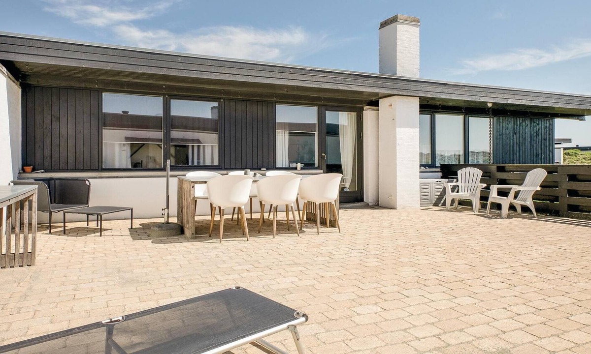 Pandrup House | A very cozy sunny courtyard and beautiful furniture create a good vacation home atmosphere here.