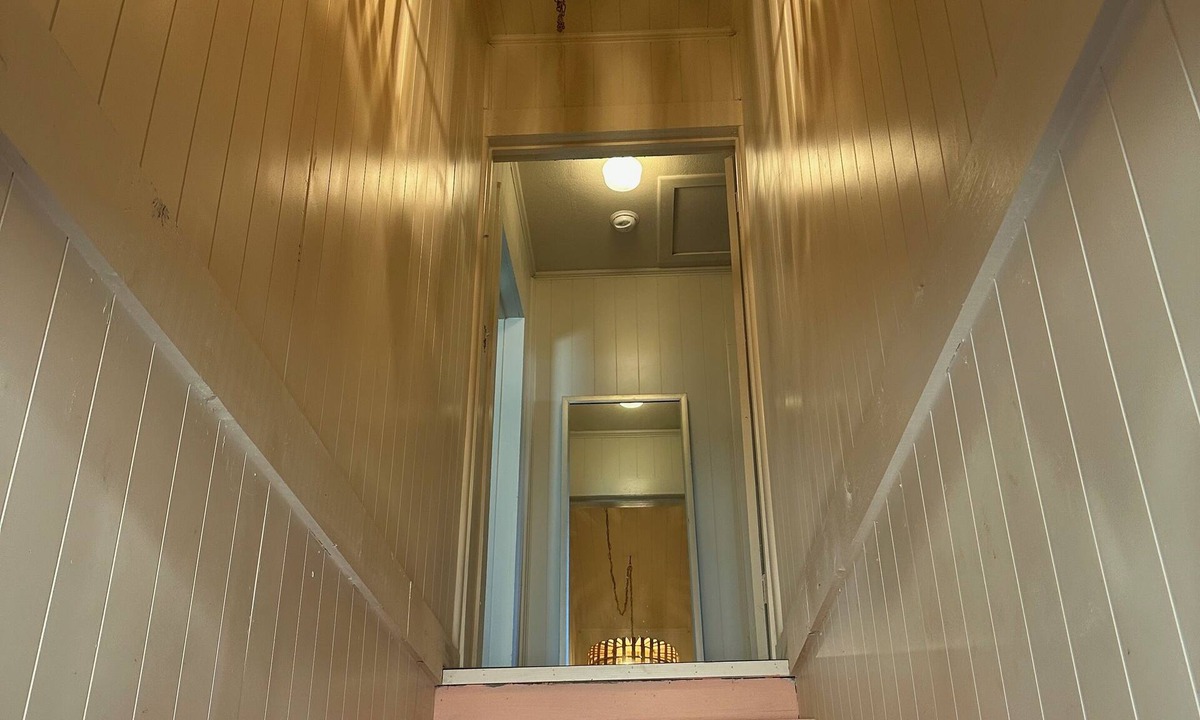 La Grange Apartment | Above the pink stairs ~ a quiet eclectic garage apartment.