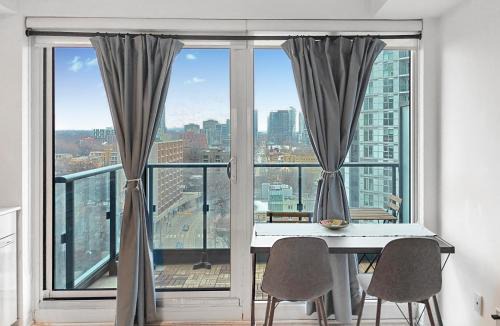 Garden District Apartment | Absolute Heart of Toronto Electric Downtown Studio by Eaton Centre & Dundas Sq