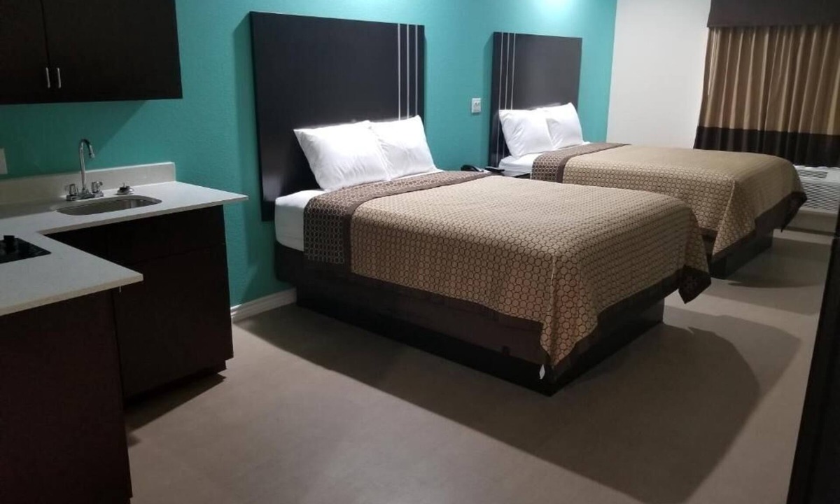 Bay City Hotel | Affordable Room Perfect for Families, Equipped w/Kitchenette and Large Bathroom