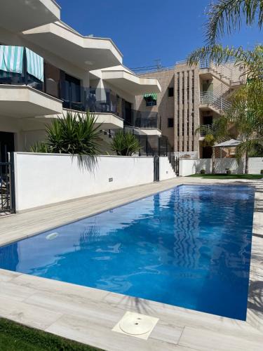 Santiago de la Ribera Apartment | Air-conditioned Elisa Apartment with spacious sunroof lounge and swimming pool