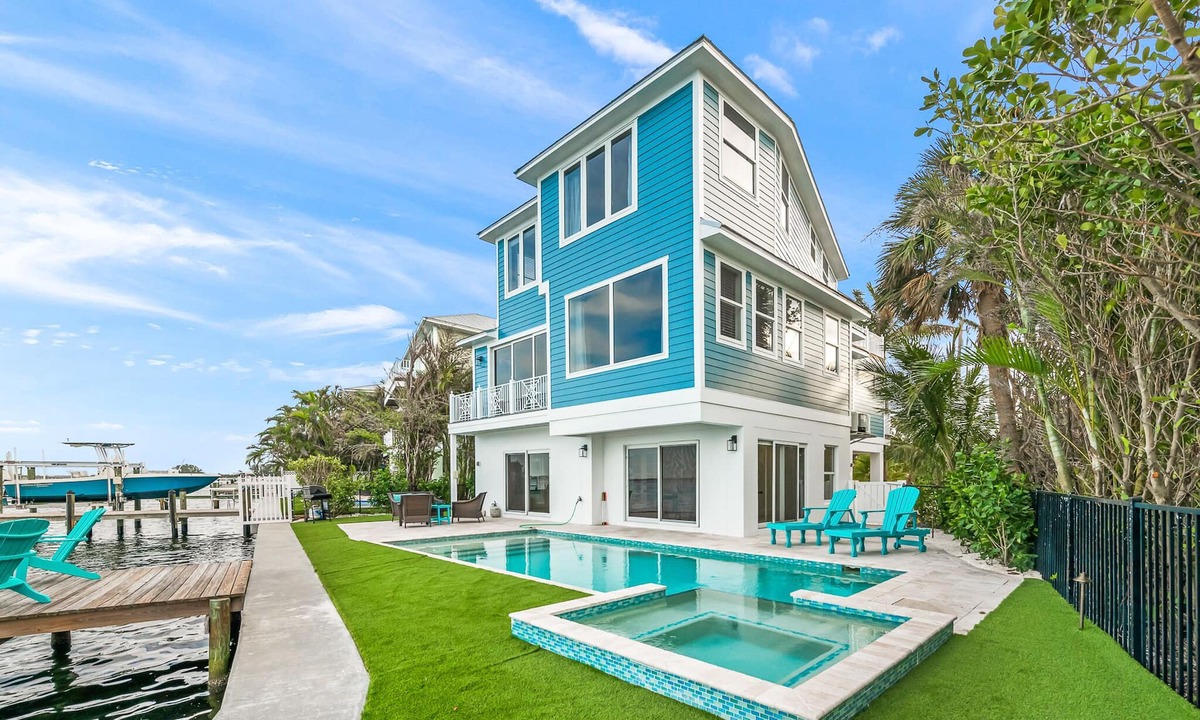Holmes Beach House | Amazing waterfront home with pool and spa, close to beach!