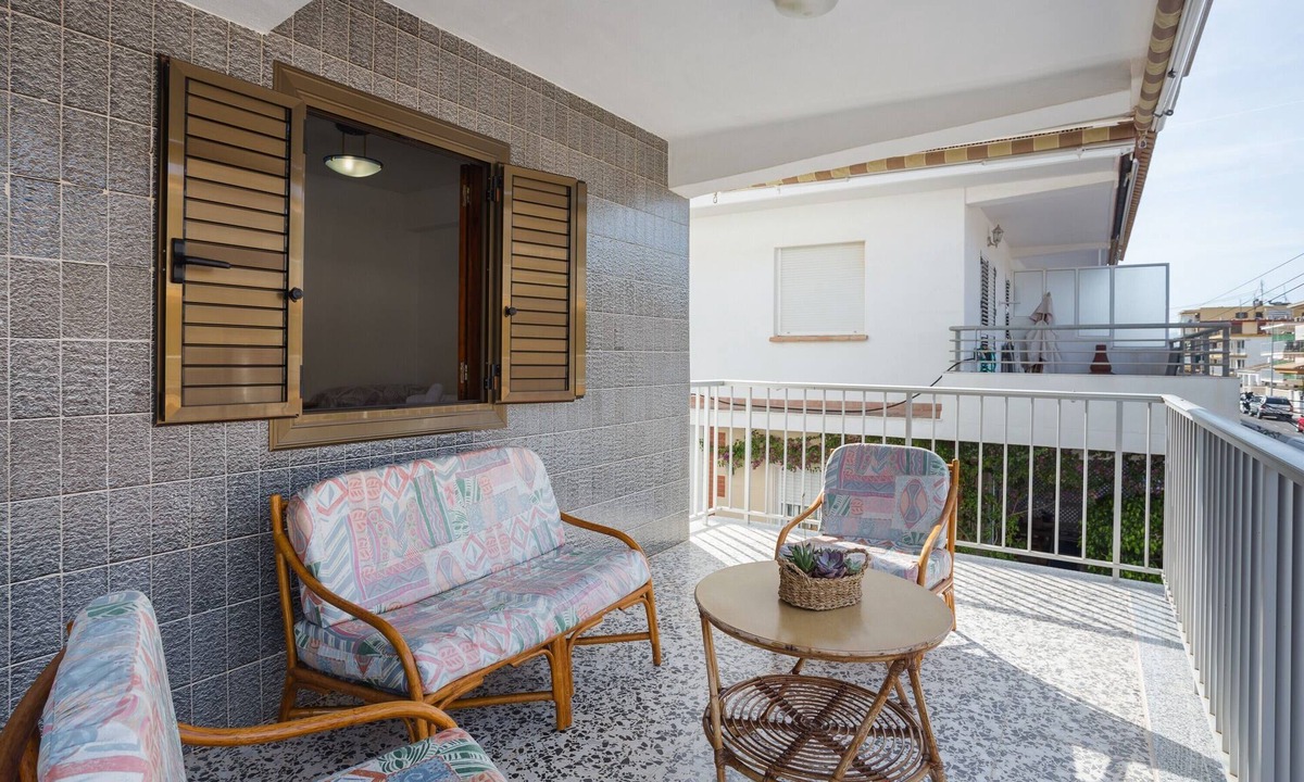 Oliva Apartment | Apartment 'Apartamento En Playa Acogedor' with Private Terrace, Wi-Fi and Air Conditioning