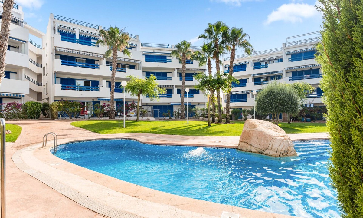 Flamenca Beach Apartment | Apartment 'In Playa Flamenca' with Shared Pool, Wi-Fi and Air Conditioning