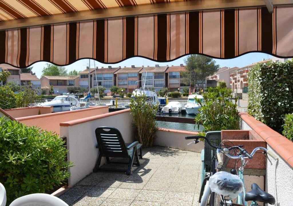 Saint-Cyprien Plage Apartment | Appartement climatisé avec terrasse dans quartier animé, parking privé - FR-1-225D-573
