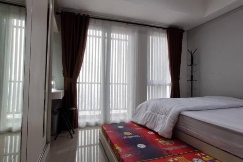 Ciputat Apartment | Apt Breeze Bintaro 1BR with Pool, Wi-Fi and Netflix by Damaresa