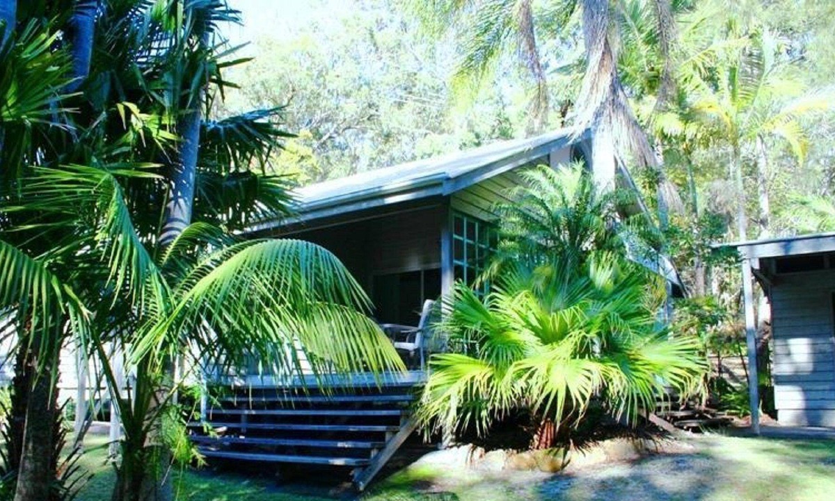 Arakoon Cottage | Architecturally designed beach house with a private covered north facing...