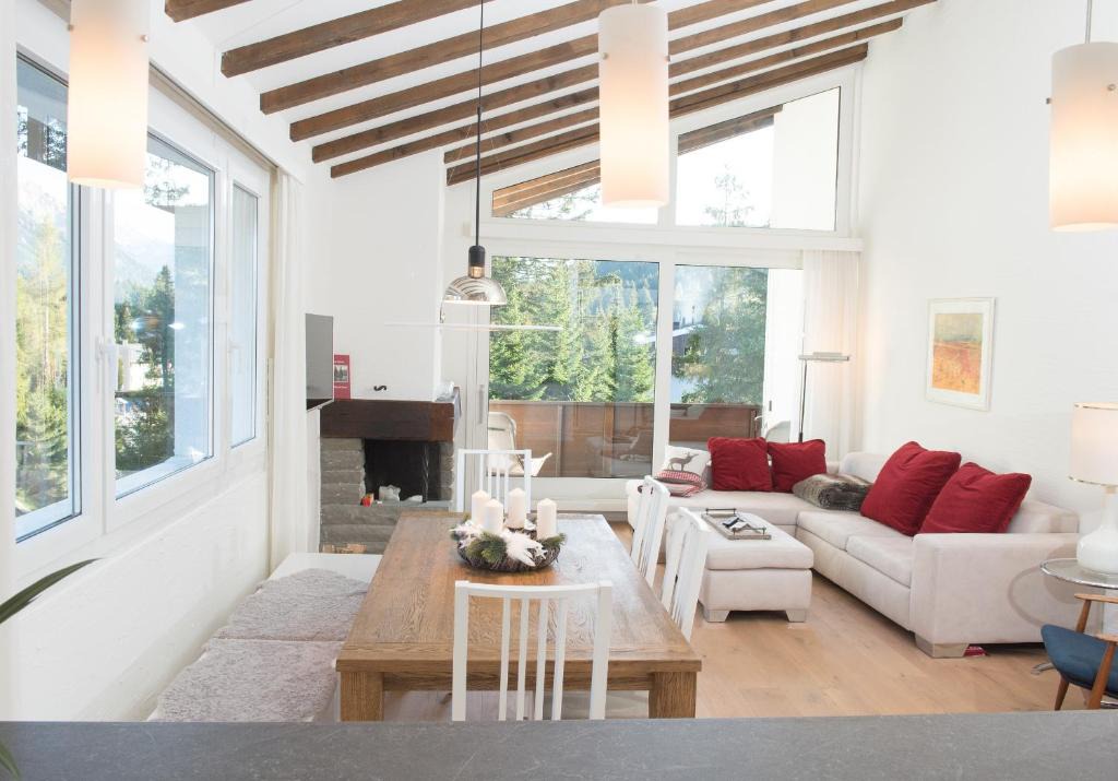 Lenzerheide Apartment | Attic apartment with pool, sauna, and fireplace
