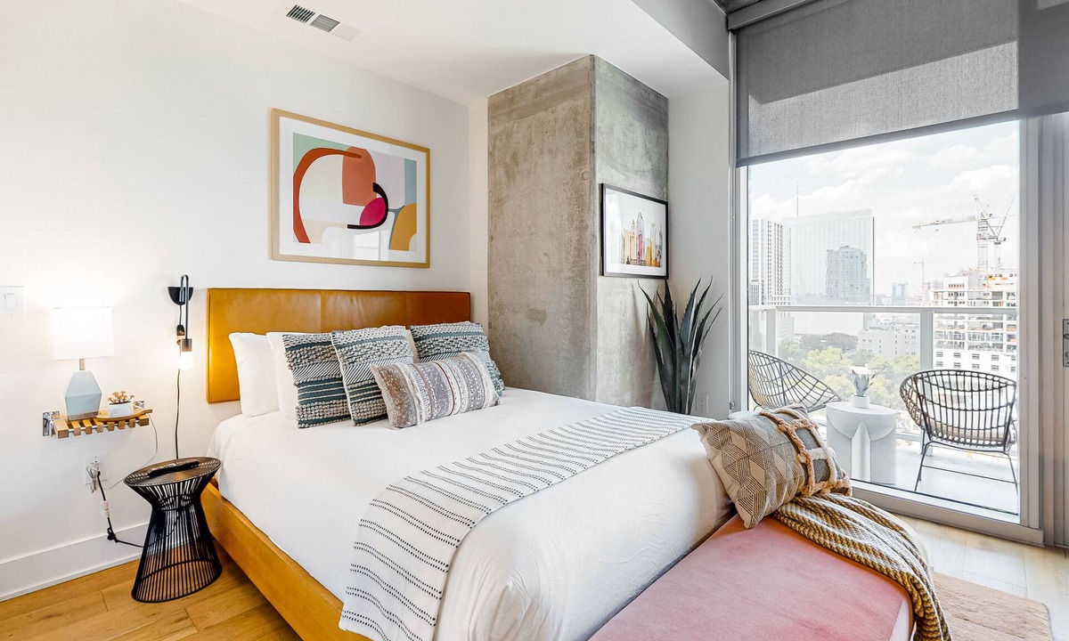 Rainey Street Historic District Apartment | Austin studio condo with WiFi, balcony, W/D, full kitchen, rooftop pool, & gym