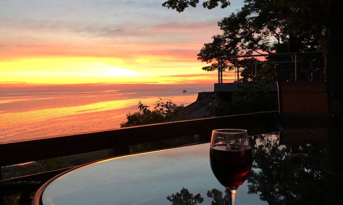 Grand Haven Cottage | Awake with the sound of the waves, lunch seeing the boats, dinner with a sunset