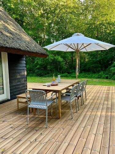 Nykobing Sjaelland House | Be Surrounded By Trees In A Thatched Cottage