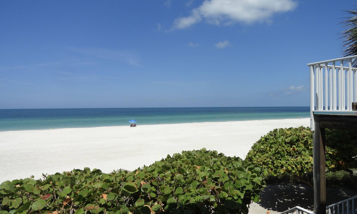 Bradenton Beach Condo | Beach House 2 Beach Front Panoramic Sunset Views Screened Lanai