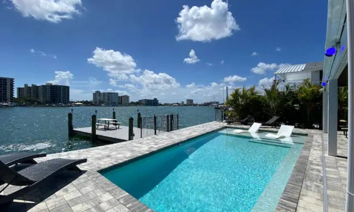 Bay Esplanade House | Beach House on the water with dock, pool & everything to enjoy the beach life.