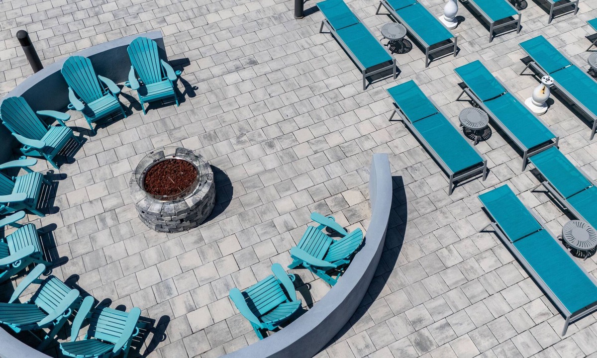 Ormond Beach Apartment | Beachfront Studio | Kitchen + Pool & Picnic Area