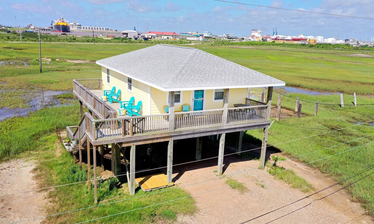 Surfside Beach Cottage | Beautiful and cozy home with large deck and expansive views.