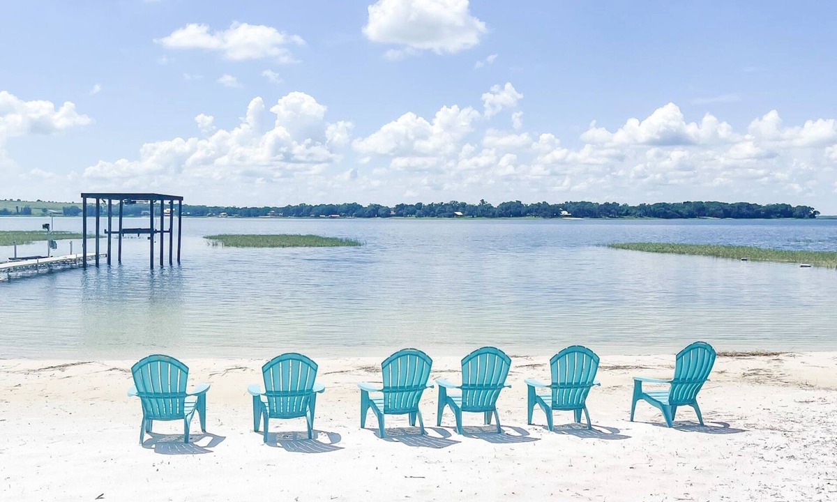 Crooked Lake House | Beautiful home with white sand beach on stunning Crooked Lake