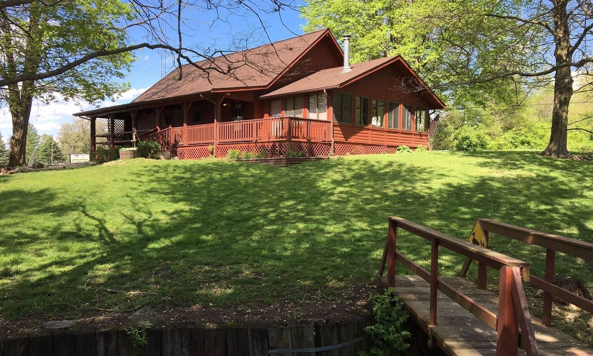 Attica House | Beautiful Lofted Home with Rugged Wood Interior Featuring Large Beams