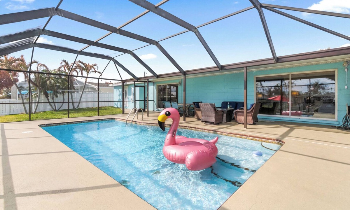 Venetian Way House | Beautiful Riverfront House — Screened Lanai, Pool, Private Dock & Pet‑Friendly! 🌊