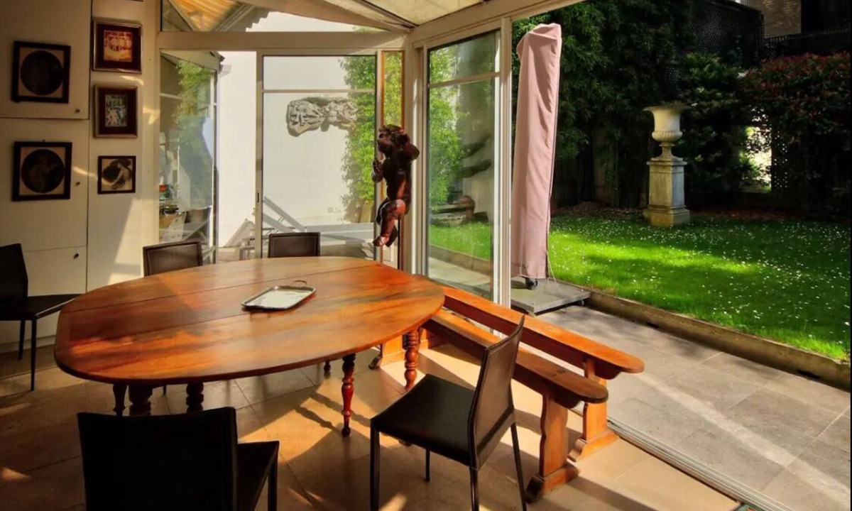 Neuilly-sur-Seine House | Bedroom and small study on veranda overlooking quiet garden