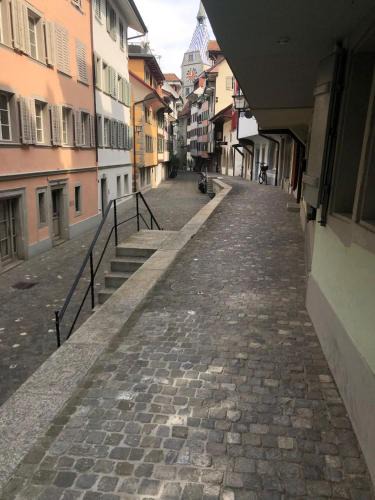 Zug House | Bedroom cum office with shared shower in Zug's Old Town