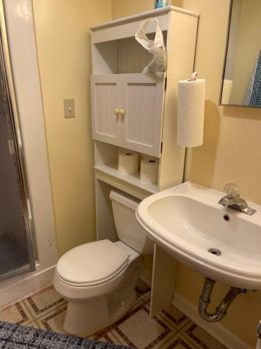 Silver Spring House | Bedroom & Shower - Two Double Beds on Ground Floor