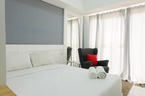 Bumi Serpong Damai Apartment | Best Price Studio at Casa De Parco Apartment By Travelio
