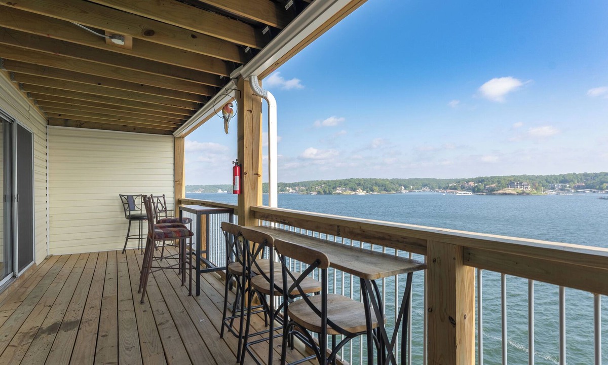 Osage Beach Condo | Bldg 10-Large DECK-2 Pools/Sandy Beach Area - Main Channel viewnBoat slip avail.