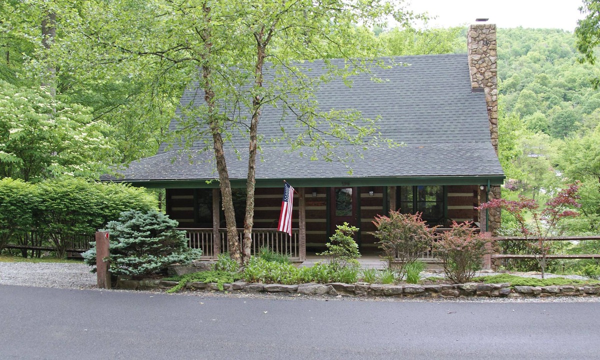 Seven Devils Cabin | Book your Spring getaway now! Firepit. Pond view.