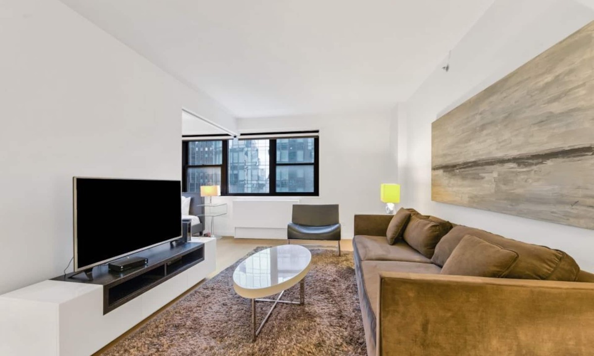 Tudor City Condo | Bright 1BR at The Nash with Roof Deck