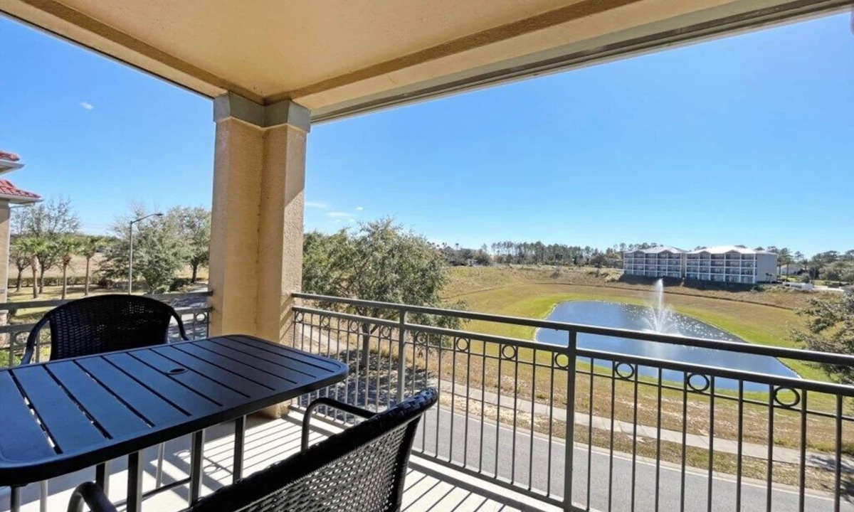 Wellington Condo | Bright condo with south facing balcony overlooking pond